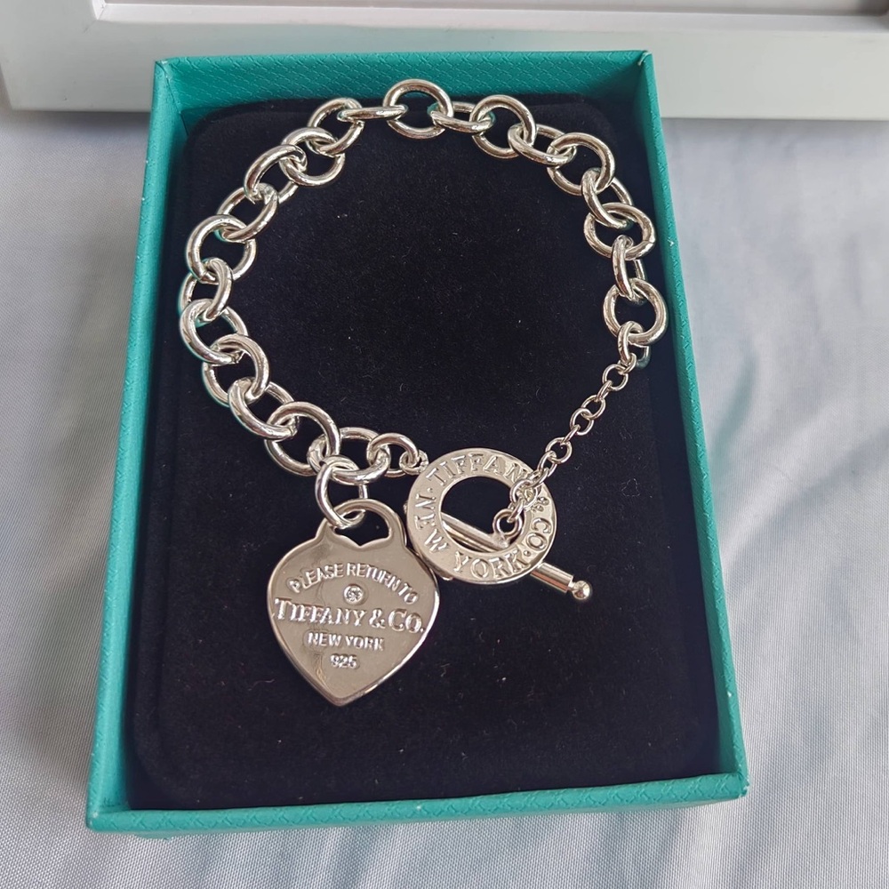 Tiffany & Co  Elegant Silver Heart Charm Bracelet